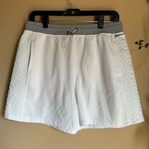Nine West size medium comfy, quilted, white active shorts with pockets!